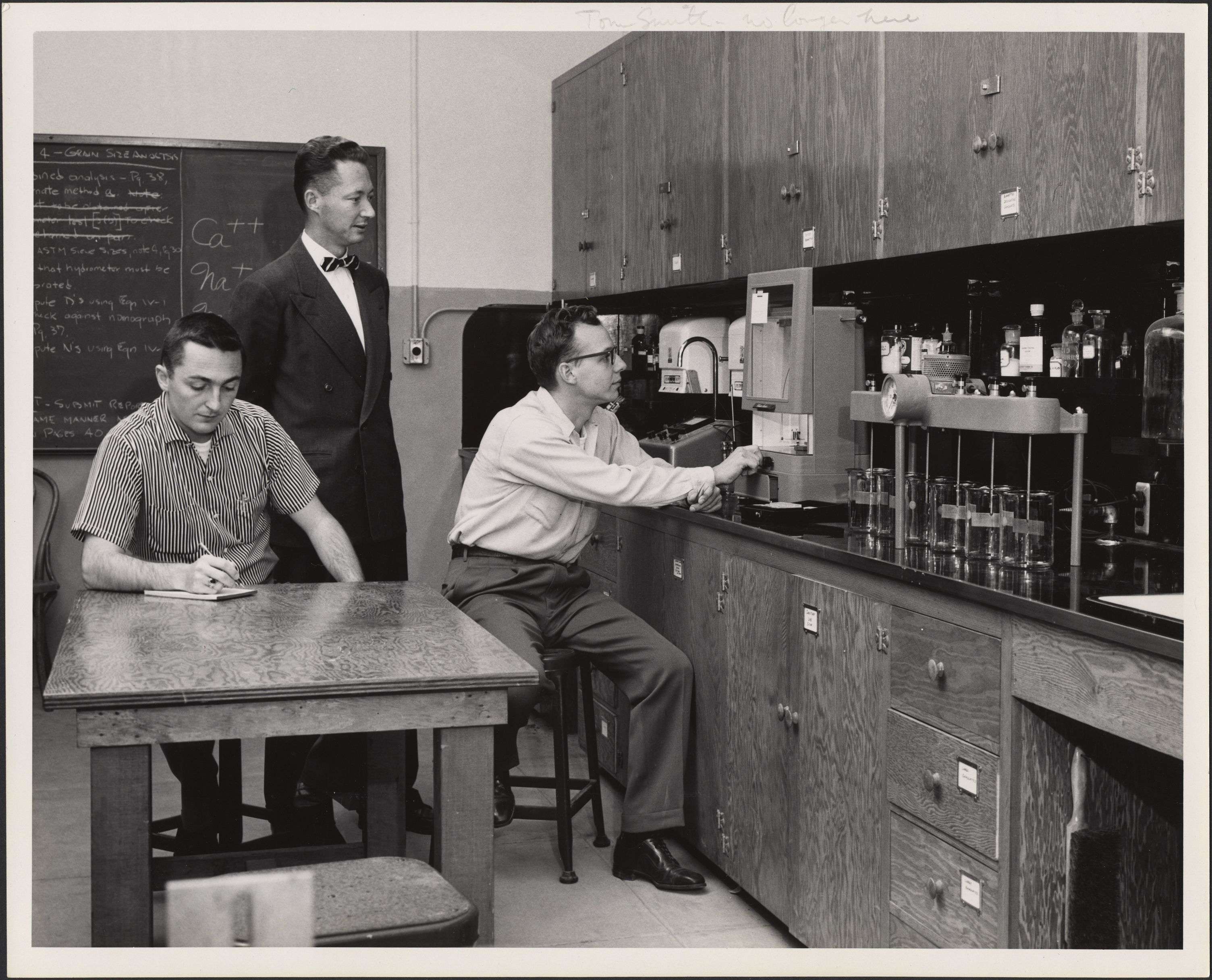 Preview of Joseph Frangini with students in the Sanitary Engineering Laboratory